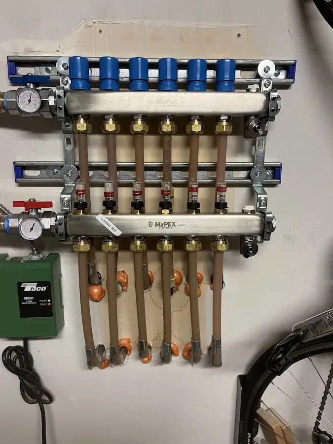 Plumber performing Sink Repair at a residential property in Wolf